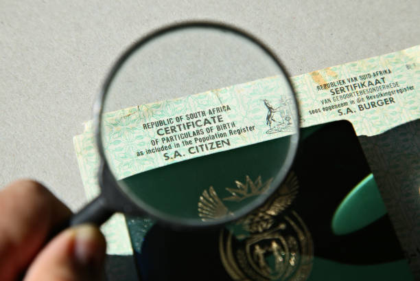 A South African birth certificate and Identity document. Home affairs concept image.