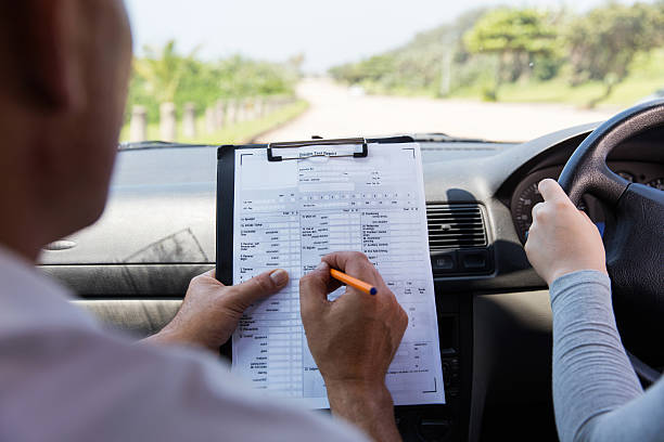 back view of girl taking driving test